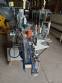 Automatic labeling machine for flat cylindrical bottles and jars Maqmundi