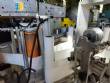 Automatic labeling machine for flat cylindrical bottles and jars Maqmundi
