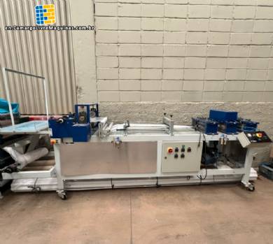 Line for manufacturing disposable non-woven shoe soles