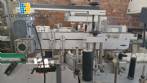 Automatic double head labeling machine for flat bottles Bauch Campos