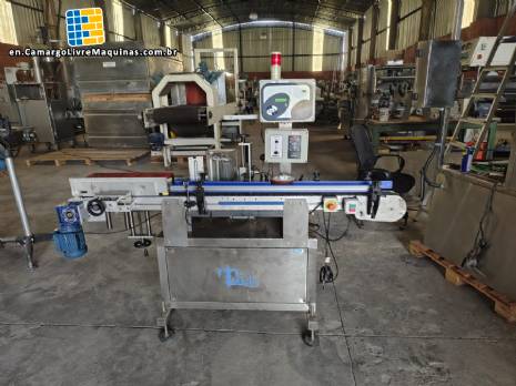 Automatic self-adhesive labeling machine for cylindrical bottles