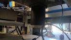 Automatic self-adhesive labeling machine for cylindrical bottles