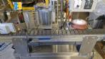 Automatic self-adhesive labeling machine for cylindrical bottles