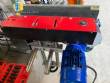 Automatic self-adhesive labeling machine for cylindrical bottles