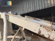 Inclined conveyor belt with talisca