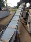 Inclined conveyor belt with talisca
