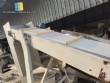 Inclined conveyor belt with talisca