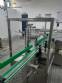 Linear filling machine with 12 filling nozzles