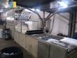 Automatic machine for manufacturing plastic cups