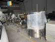 Milainox automatic rotary filling, dosing, and sealing machine for cups, pots, and jars.