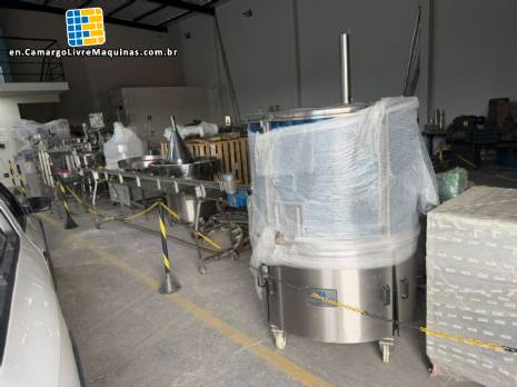 Milainox automatic rotary filling, dosing, and sealing machine for cups, pots, and jars.