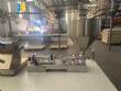 Cetro benchtop ultrasonic tube and pipe filling and dosing machine.