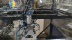 Pick and place product feeder for flowpack transfer cartoning machine