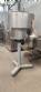 Complete filling line with Tecman Nelpas Tecnoenvase Tudela bottle filling, labeling, capping, and positioning machines for cosmetic liquids.