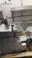 Bizerba automatic stainless steel slicer for cheeses, cold cuts, sausages, and meats.