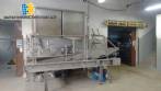 Treadmill with silo and vibrating gutter