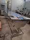 Stainless steel conveyor table with belt for accumulation assembly