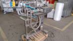 Filling machine with 2 nozzles for liquids and pilfer cap screwer
