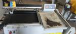 L-shaped sealer with shrink tunnel for packaging packages Smipack