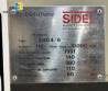 Sidel PET bottle blow molding machine, 4,000 bottles per hour.