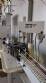 Linear filling machine with stainless steel threading machine 12 Narita nozzles