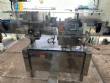 Packaging line with IMSB bung capper, Maqmundi labeler and accumulator table