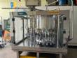 Stainless steel rotary filling machine with 16 IMSB nozzles for bottles and jars