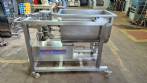 Unifiller stainless steel dosing pump with homogenizing mixer for bakery foods.