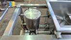 Unifiller stainless steel dosing pump with homogenizing mixer for bakery foods.