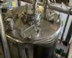 Gravimetric rotary filling machine in stainless steel with cabin