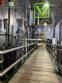 Gravimetric rotary filling machine in stainless steel with cabin