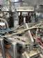 Automatic rotary dosing filling machine with sealer for Delgo cups, 3500 cups per hour.