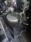 Erli rotary liquid filling machine with 4 pistons, 14,400 units per hour.