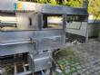 Filling line for 10 and 20 liter gallon jugs with filling machine and rinser/washer.