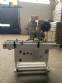 Labeling machine for boxes and top lids