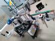 Automatic labeler for flat bottles