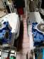 Automatic labeler for flat bottles