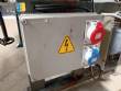 Automatic labeler for flat bottles