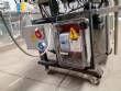 Automatic labeler for flat bottles