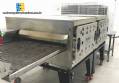 Industrial tunnel oven for cooking food