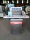 Tempering machine with cover plate coupled to Sidmaq