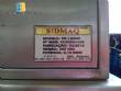 Tempering machine with cover plate coupled to Sidmaq