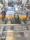 Adhesive tape case sealer with safety enclosure and door sensors Strapack