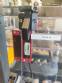 Adhesive tape case sealer with safety enclosure and door sensors Strapack