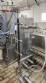 Continuous tunnel immersion pasteurizer for bottles and packaging - TECNINT