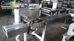 Varied flow pack wrapping machines