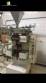 Packing and filling machine for sachets