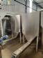 Stainless steel bagging storage silo with screw conveyor outlet