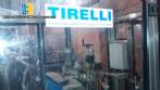 Tirelli labeller for bottles, Cologne and perfumes