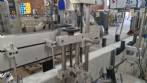 Automatic double head labeling machine for self-adhesive labels Bauch Campos
